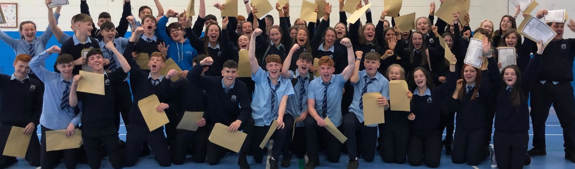 St Catherine's VS Pupils holding up exam results